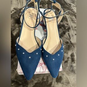 Blue flat shoes